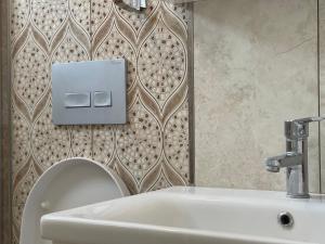 A bathroom at X SUITE APART