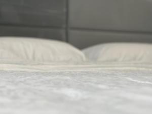 A bed or beds in a room at X SUITE APART