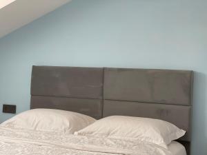 A bed or beds in a room at X SUITE APART