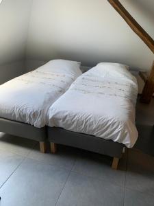 Postel nebo postele na pokoji v ubytování 't Brouwershuis
