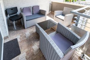 Posedenie v ubytovaní ELITE CENTER APARTMAN + 8 fotografií