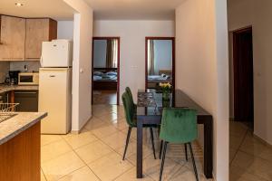Kuchyňa alebo kuchynka v ubytovaní ELITE CENTER APARTMAN