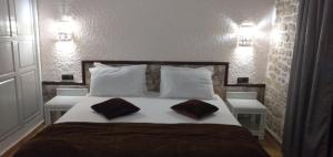 Postel nebo postele na pokoji v ubytování Kaouki beach Apart'hotel