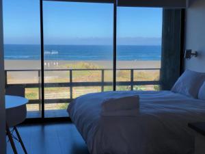 Postel nebo postele na pokoji v ubytování Ventana Al Mar