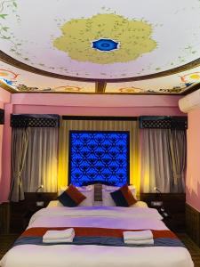 Tempat tidur dalam kamar di Hotel ABC, Boutique Hotel in Pokhara