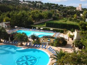 a view of the pool at the resort at Baia Degli Aranci Suite & Apartments in Vieste