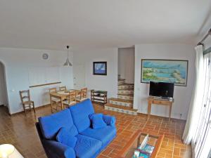 Televízia a/alebo spoločenská miestnosť v ubytovaní Cove Noves - Relax en Menorca, Ideal para familias