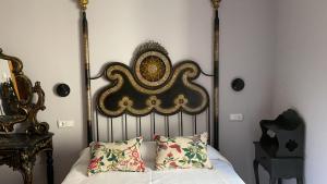 Postel nebo postele na pokoji v ubytování Hotel-Hospedería los Templarios