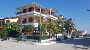 a building on the side of a street at Villa Moras in Paralia Katerinis
