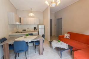 A kitchen or kitchenette at Vasileiou Apartments