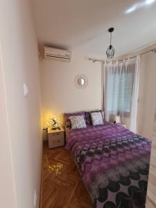 Postel nebo postele na pokoji v ubytování Happy Moments