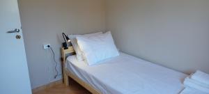 Posteľ alebo postele v izbe v ubytovaní Beachfront 3-bedroom apartment