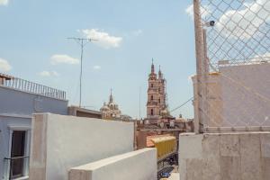 a view of a city from a building at Violeta Hotel Boutique in Tepatitlán de Morelos