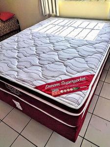a mattress sitting on the floor in a room at Acqua Ville Flats II - Caldas Novas Center in Caldas Novas