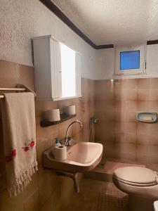 Kúpeľňa v ubytovaní Apartments Kritika