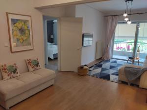 Posedenie v ubytovaní Orion - Charming 1-bedroom condo at convenient location.
