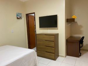 TV a/nebo společenská místnost v ubytování Bertolini Hotel