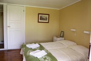 Letto o letti in una camera di Gula Hönan Guest House