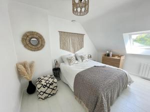 Posteľ alebo postele v izbe v ubytovaní Maison chaleureuse avec Jacuzzi