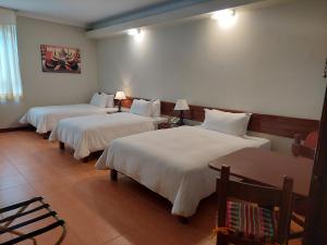 Postel nebo postele na pokoji v ubytování Lima Wasi Hotel Miraflores + 37 fotografií