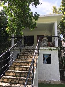 a set of stairs in front of a house at Villa Mar Sosua in Sosúa