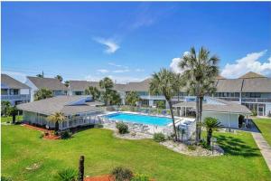 an aerial view of a resort with a swimming pool at New listing!!! 4 min walk to the beach! in Destin