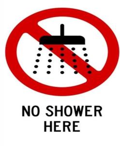 a no shower sign with a ladybug on it at Rossu haagissuvila in Saksa