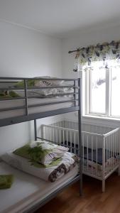 Voodi või voodid majutusasutuse Brúnalaug Guesthouse - Holiday Home toas