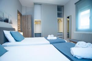 Katil atau katil-katil dalam bilik di Harmony Luxury Apartment