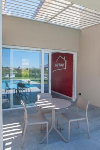 Fotografie z fotogalerie ubytování B&B Lough v destinaci Colà di Lazise