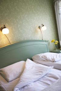 Letto o letti in una camera di Gula Hönan Guest House