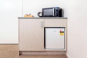 Dapur atau dapur kecil di The Com Plex Motel