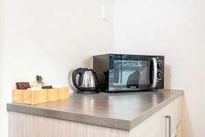 Dapur atau dapur kecil di The Com Plex Motel