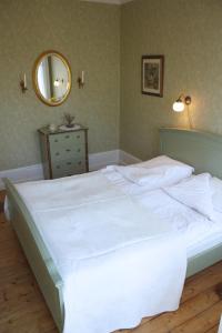 Letto o letti in una camera di Gula Hönan Guest House