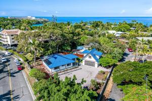 an aerial view of a house with a blue roof at The Shack in Kailua-Kona