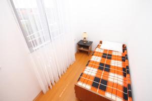 Postel nebo postele na pokoji v ubytování Apartments with parking spaces Novalja, Pag - 6524