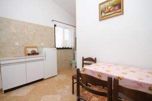 Kuchyň nebo kuchyňský kout v ubytování Apartments with parking spaces Novalja, Pag - 6524 + 18 fotografií