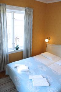 Letto o letti in una camera di Gula Hönan Guest House