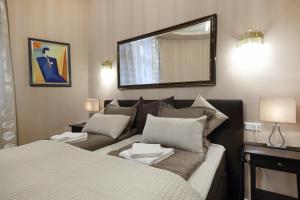 Posteľ alebo postele v izbe v ubytovaní Urban Flats Vienna City Center