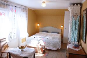 Кровать или кровати в номере Gula Hönan Guest House