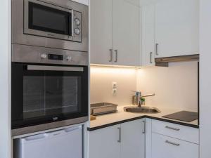 Gallery image of Studio cabine 6 pers, pistes à proximité, balcon, cave à skis, cuisine équipée - FR-1-400-110 in Eaux-Bonnes