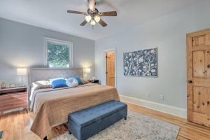 a bedroom with a bed and a ceiling fan at R Dawg House Walking distance to Everything Athens in Athens