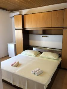 Postel nebo postele na pokoji v ubytování Apartments and rooms with parking space Baska Voda, Makarska - 17277