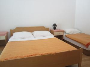 Posteľ alebo postele v izbe v ubytovaní Apartments by the sea Biograd na Moru, Biograd - 17298