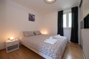 Zdjęcie z galerii obiektu Apartments with a parking space Liganj, Opatija - 17370 w mieście Lovran +7 zdjęć