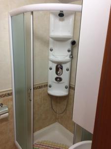 a shower stall with a toilet and a sink at Apartments with a parking space Brela, Makarska - 17371 in Brela