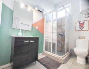 a bathroom with a shower and a toilet and a sink at AS Monastiraki Apartment 1B in Athens +24 photos
