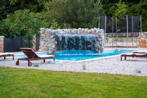 Fotografia z galérie ubytovania Luxury villa with a swimming pool Vrbnik, Krk - 17429 vo Vrbniku