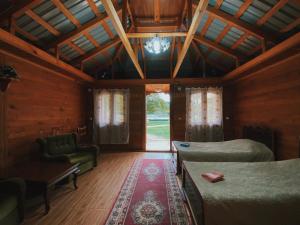 Katil atau katil-katil dalam bilik di Matua guest house