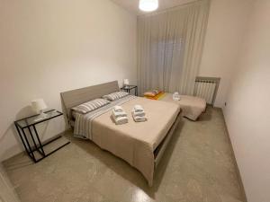 Postel nebo postele na pokoji v ubytování Pescara49 Centralissimo Appartamento